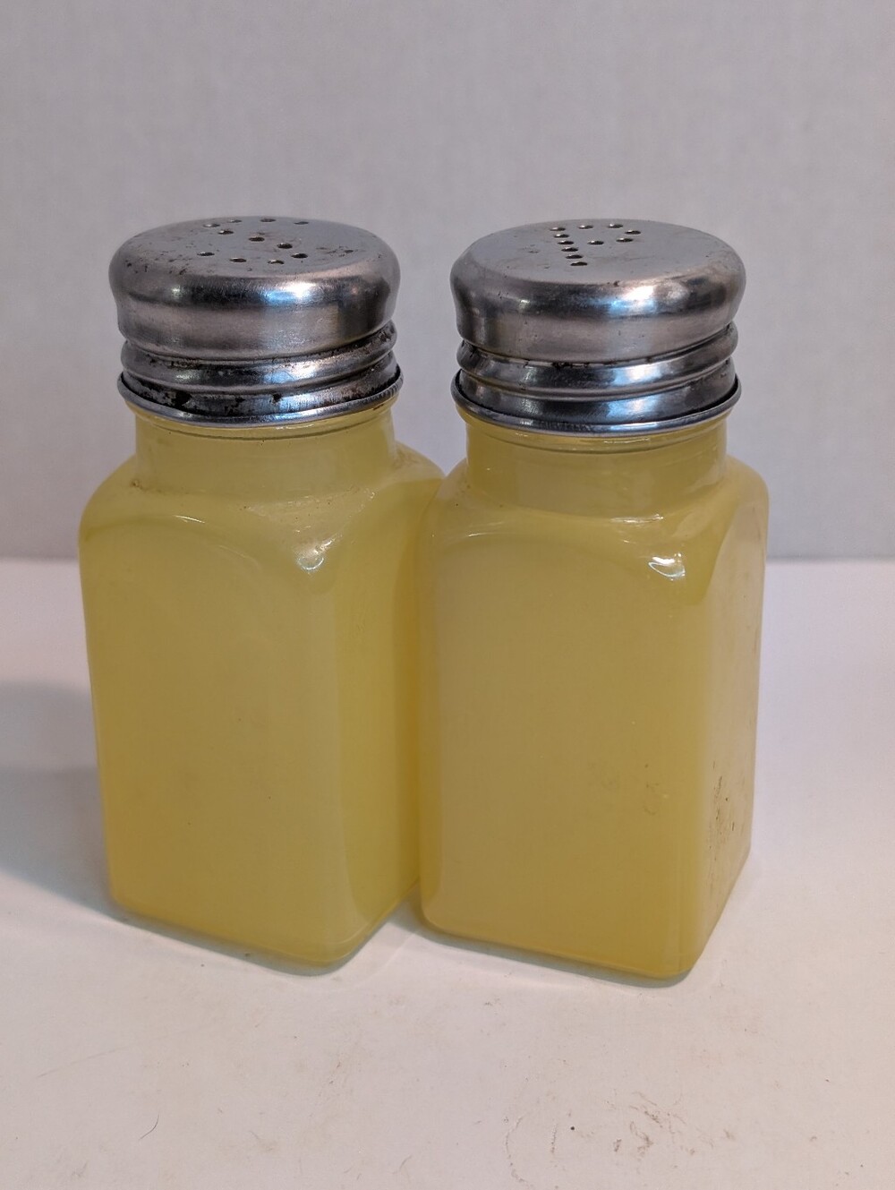 Yellow S & P Glass Salt and Pepper Shakers Metal Lids Punched Letters